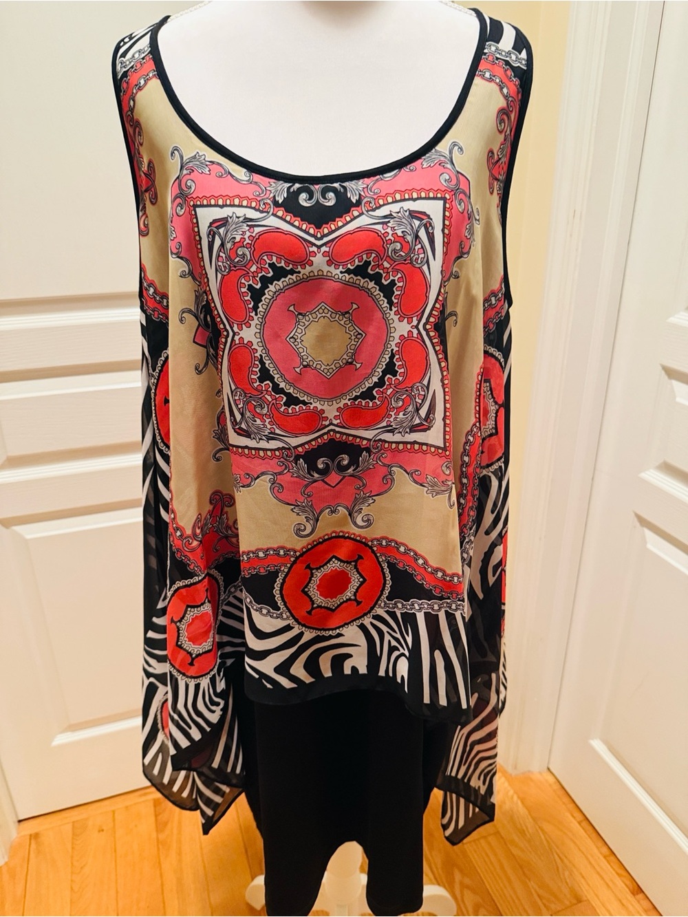 S.L. Fashions dress with handkerchief- hem top featuring black pink color